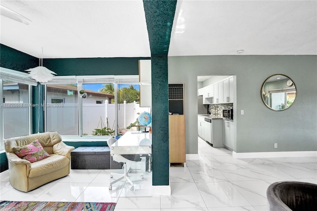 651 E Evanston Cir, Fort Lauderdale, FL 33312 - living area with baseboards and light marble finish flooring