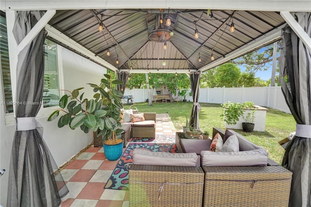 651 E Evanston Cir, Fort Lauderdale, FL 33312 - fenced backyard featuring an outdoor living space, a gazebo, and a patio