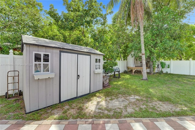 651 E Evanston Cir, Fort Lauderdale, FL 33312 - view of shed with a fenced backyard