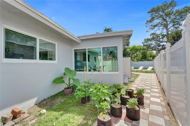 651 E Evanston Cir, Fort Lauderdale, FL 33312 - view of home's exterior featuring stucco siding