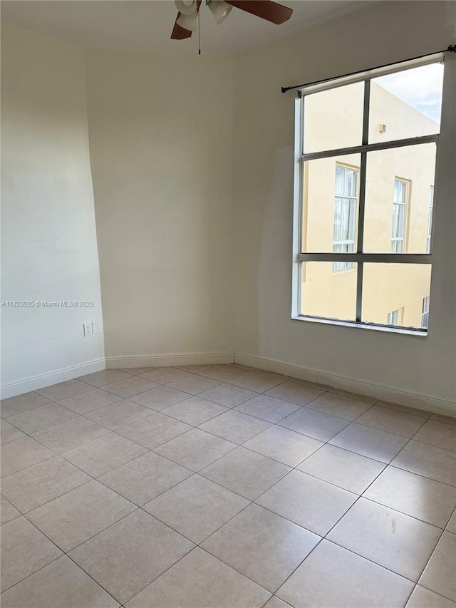 7400 W 20th Ave Unit 416, Hialeah, FL 33016 - tiled empty room with ceiling fan and baseboards