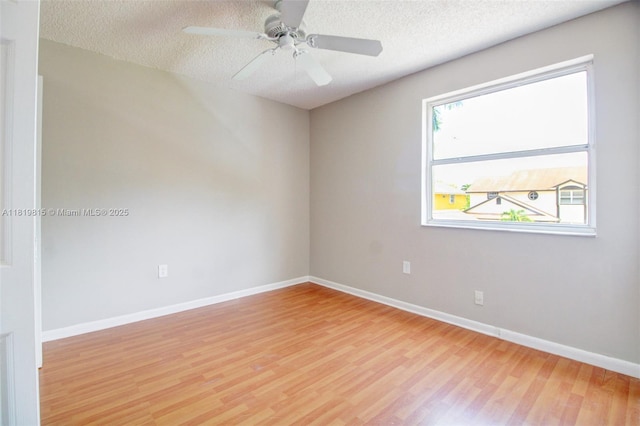 9741 SW 12th St, Pembroke Pines, FL 33025 - empty room featuring light wood-type flooring, a textured ceiling, and ceiling fan