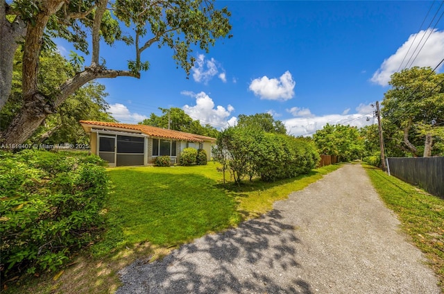 810 NE 119th St, Biscayne Park, FL 33161 - view of yard with driveway