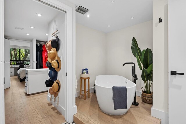 141 Crandon Blvd Unit 237, Key Biscayne, FL 33149 - corridor with light wood-style floors and recessed lighting