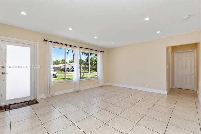 918 NE 6th St, Hallandale Beach, FL 33009 - spare room featuring recessed lighting, light tile patterned floors, and a smoke detector