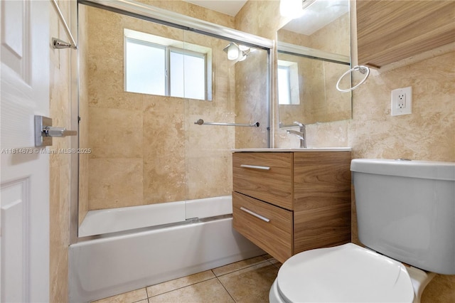 918 NE 6th St, Hallandale Beach, FL 33009 - full bathroom featuring vanity, shower / bath combination with glass door, and tile patterned flooring