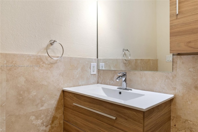 918 NE 6th St, Hallandale Beach, FL 33009 - bathroom featuring vanity and tile walls