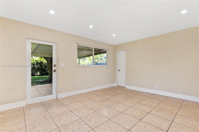 918 NE 6th St, Hallandale Beach, FL 33009 - unfurnished room featuring recessed lighting and light tile patterned floors