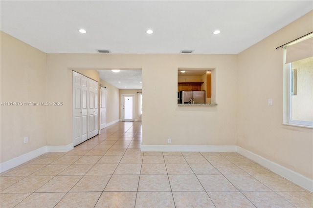 918 NE 6th St, Hallandale Beach, FL 33009 - unfurnished room featuring recessed lighting and light tile patterned floors