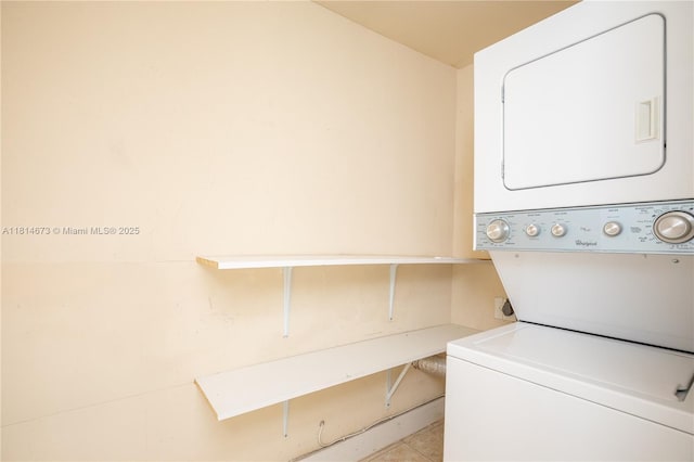 918 NE 6th St, Hallandale Beach, FL 33009 - laundry area featuring stacked washing machine and dryer