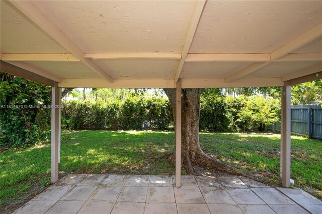 918 NE 6th St, Hallandale Beach, FL 33009 - fenced backyard featuring a patio