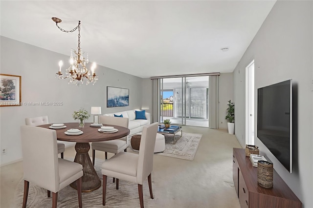14575 Bonaire Blvd Unit 308, Delray Beach, FL 33446 - dining space with a chandelier and light colored carpet