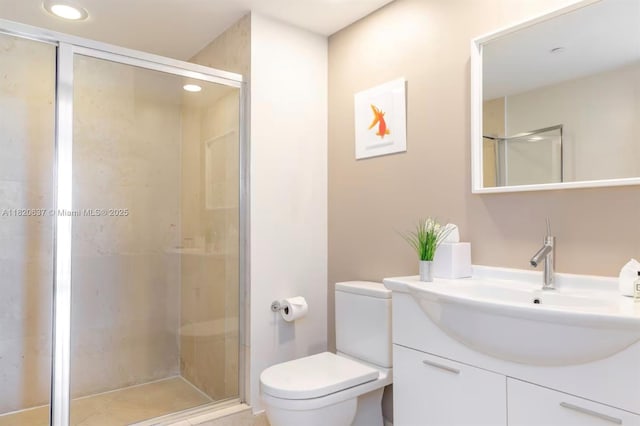 485 Brickell Ave Unit 3410, Miami, FL 33131 - bathroom with vanity, a stall shower, and recessed lighting