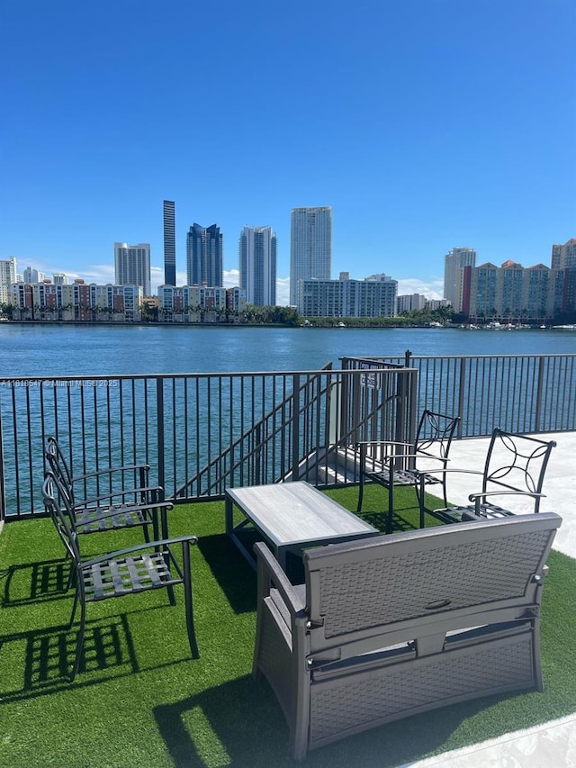 4000 NE 168th St Unit 110A, North Miami Beach, FL 33160 - view of home's community featuring a view of skyline and a water view