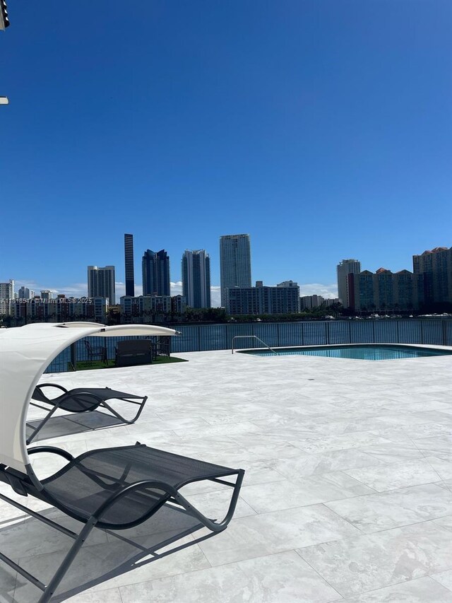 4000 NE 168th St Unit 110A, North Miami Beach, FL 33160 - community pool with a view of skyline