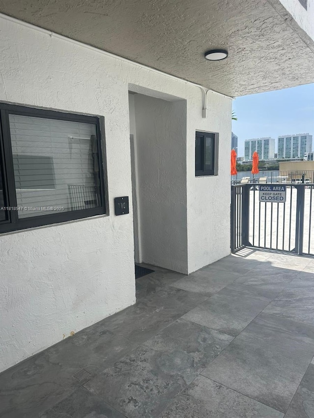 4000 NE 168th St Unit 110A, North Miami Beach, FL 33160 - view of patio / terrace
