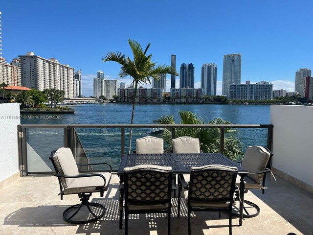 4000 NE 168th St Unit 110A, North Miami Beach, FL 33160 - balcony with a skyline view and a water view