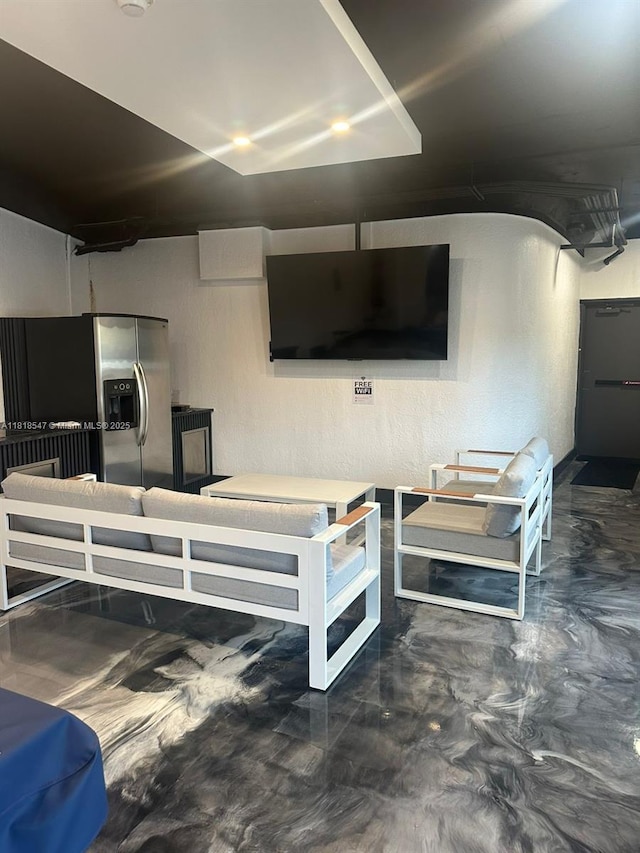 4000 NE 168th St Unit 110A, North Miami Beach, FL 33160 - living room with concrete floors