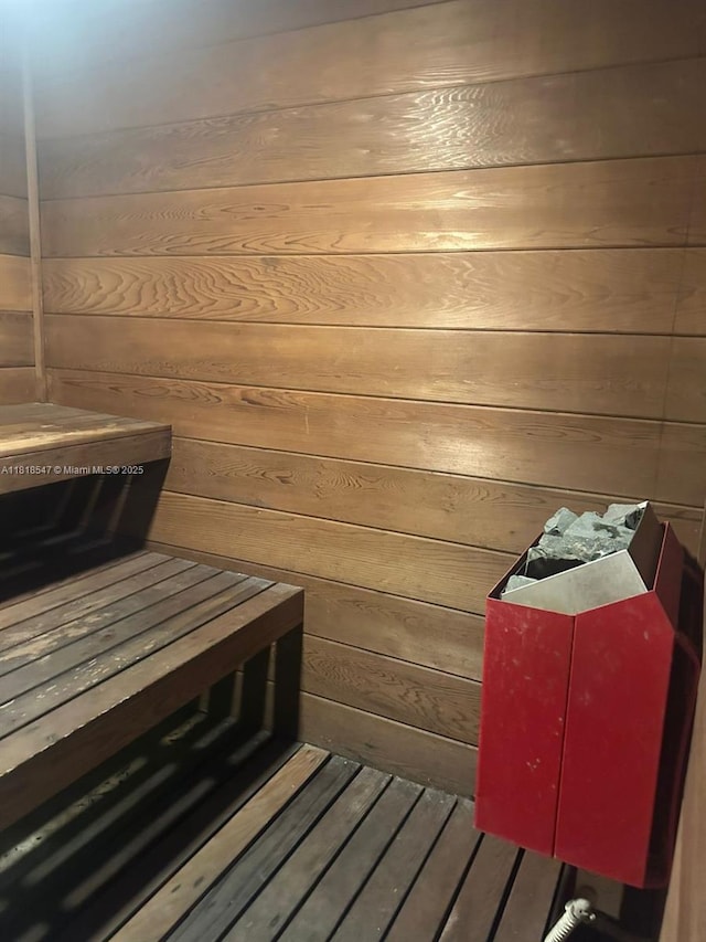 4000 NE 168th St Unit 110A, North Miami Beach, FL 33160 - relaxing sauna with wood walls and wood finished floors