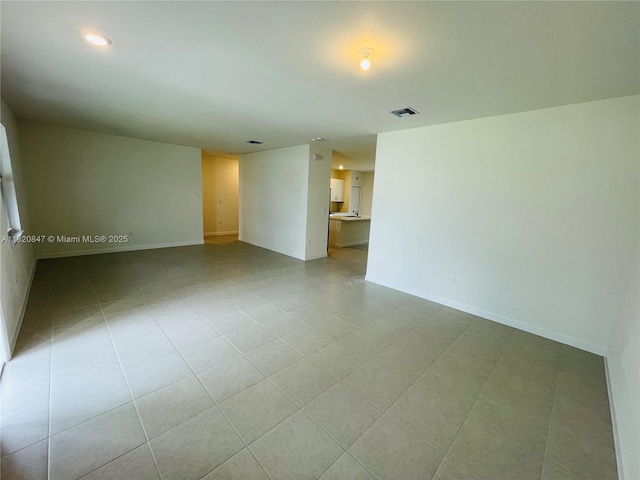 16932 SW 291st St, Homestead, FL 33030 - tiled spare room featuring baseboards and recessed lighting
