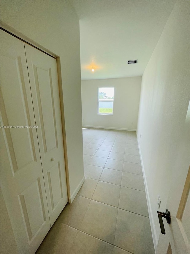 16932 SW 291st St, Homestead, FL 33030 - corridor with light tile patterned floors
