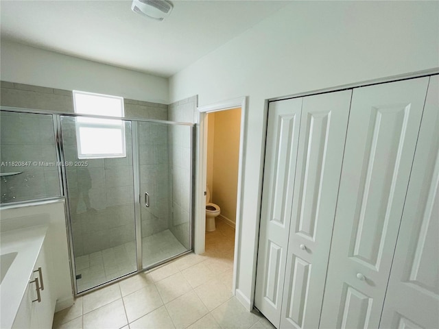 16932 SW 291st St, Homestead, FL 33030 - full bathroom with a closet, a shower stall, tile patterned floors, and vanity