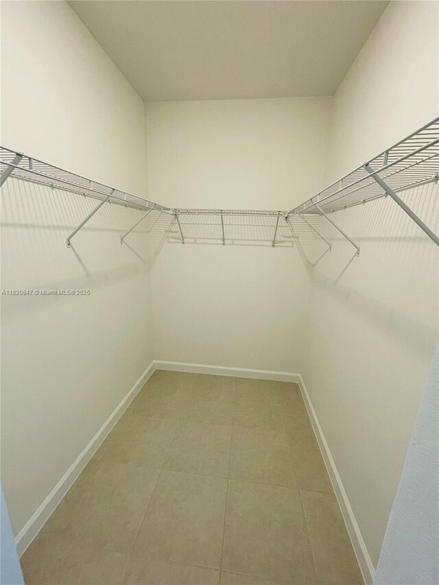 16932 SW 291st St, Homestead, FL 33030 - spacious closet with light tile patterned flooring