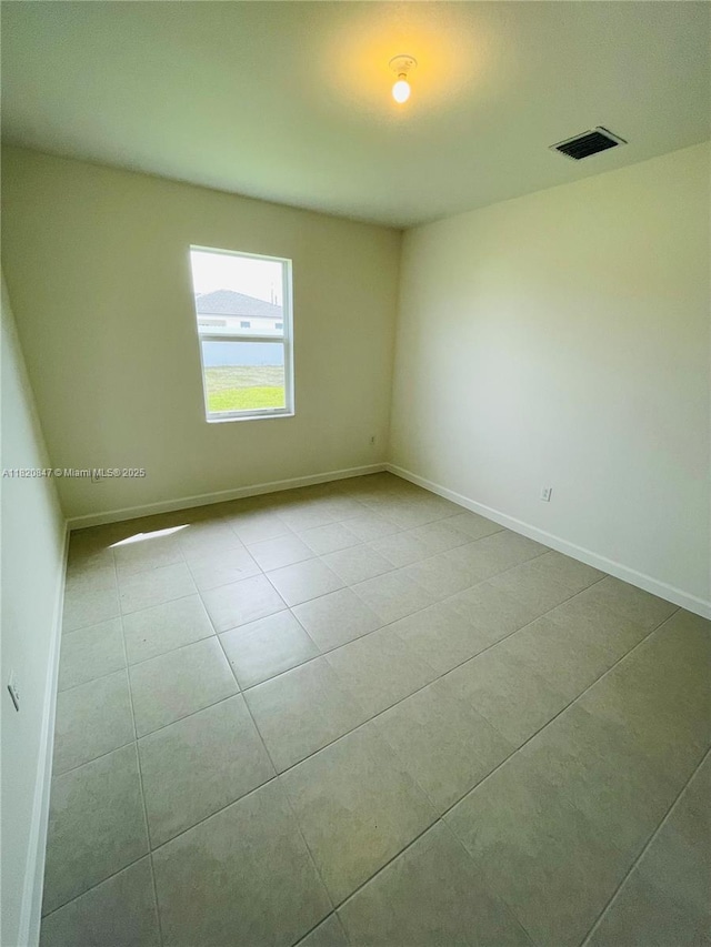 16932 SW 291st St, Homestead, FL 33030 - tiled empty room with baseboards