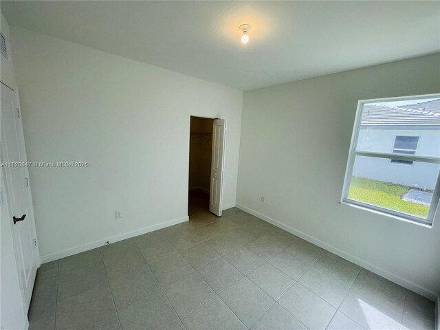 16932 SW 291st St, Homestead, FL 33030 - unfurnished bedroom featuring light tile patterned floors