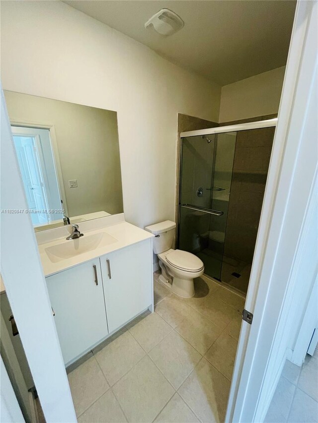 16932 SW 291st St, Homestead, FL 33030 - full bathroom with vanity, a shower stall, and tile patterned flooring