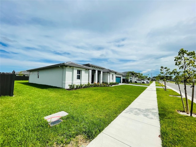 16932 SW 291st St, Homestead, FL 33030 - view of front of house featuring a garage, stucco siding, and driveway