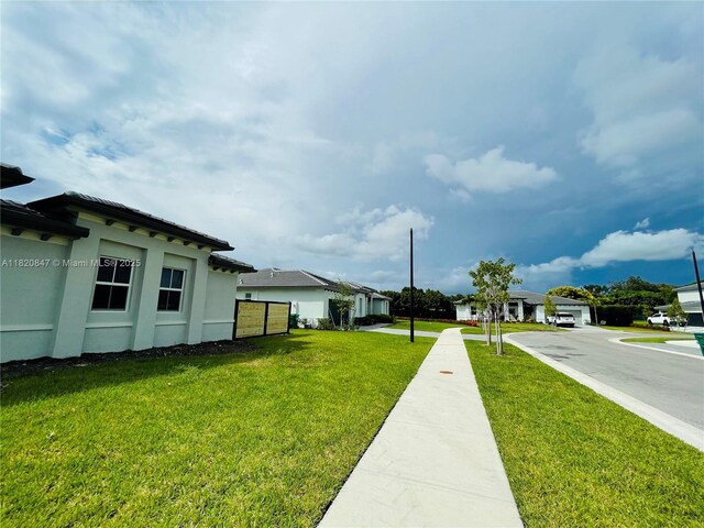 16932 SW 291st St, Homestead, FL 33030 - view of grassy yard with a residential view
