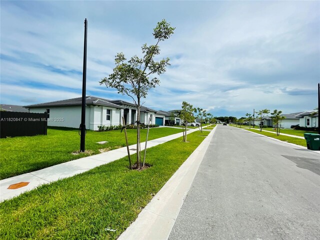 16932 SW 291st St, Homestead, FL 33030 - view of asphalt street with a residential view and sidewalks