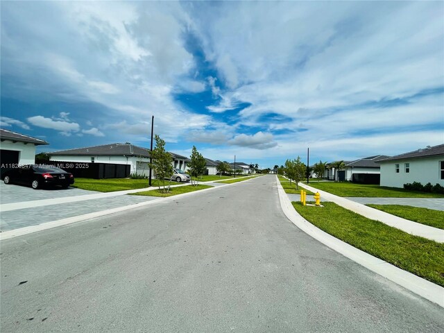 16932 SW 291st St, Homestead, FL 33030 - view of asphalt road featuring a residential view and sidewalks