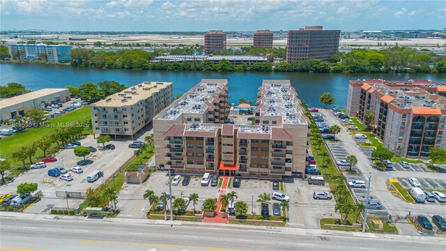 5249 NW 7th St Unit 103, Miami, FL 33126 - view of urban area featuring a nearby body of water and apartment complex / building