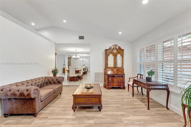 5655 NW 86th Ave, Coral Springs, FL 33067 - living area featuring a chandelier, vaulted ceiling, plenty of natural light, recessed lighting, and light wood-type flooring