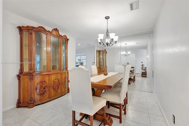 5655 NW 86th Ave, Coral Springs, FL 33067 - dining area featuring a chandelier and light tile patterned flooring