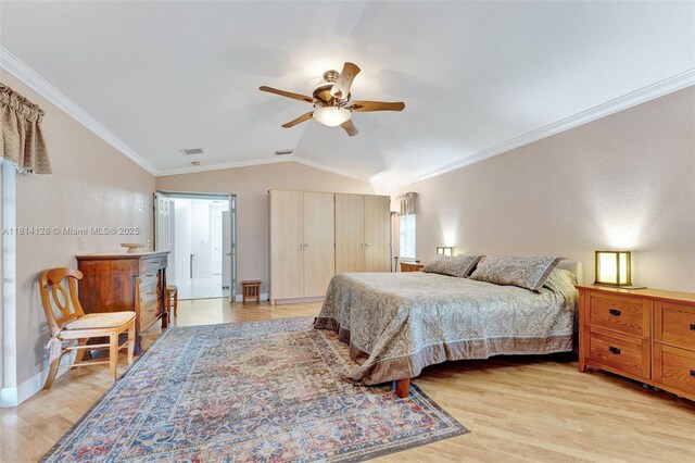 5655 NW 86th Ave, Coral Springs, FL 33067 - bedroom featuring light wood finished floors, vaulted ceiling, a ceiling fan, and ornamental molding