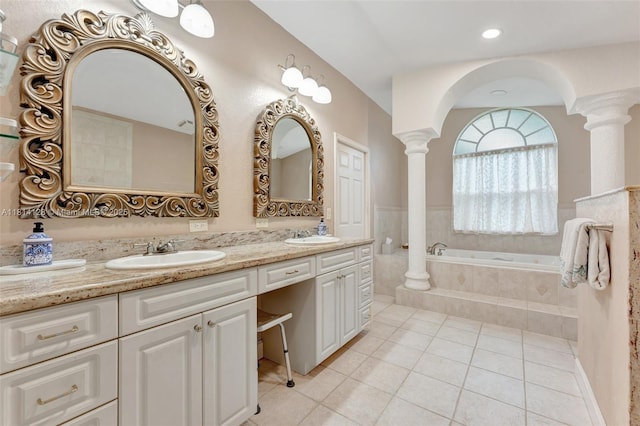 5655 NW 86th Ave, Coral Springs, FL 33067 - full bath featuring ornate columns, tile patterned flooring, double vanity, and a bath