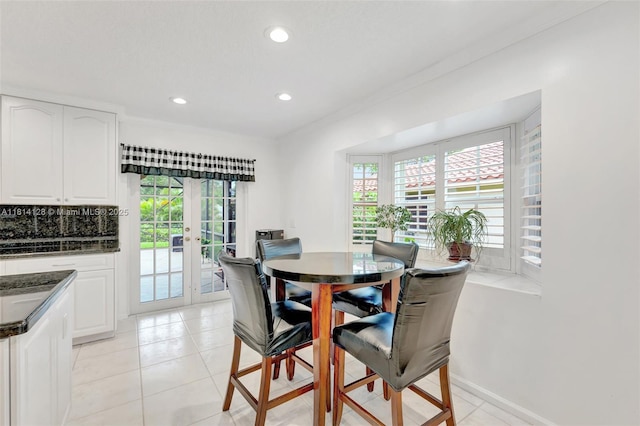5655 NW 86th Ave, Coral Springs, FL 33067 - dining room featuring french doors, recessed lighting, and light tile patterned floors