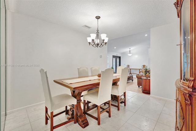 5655 NW 86th Ave, Coral Springs, FL 33067 - dining space with a chandelier, a textured ceiling, light tile patterned flooring, and recessed lighting