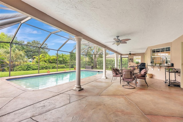 5655 NW 86th Ave, Coral Springs, FL 33067 - outdoor pool with a patio area, a ceiling fan, and glass enclosure