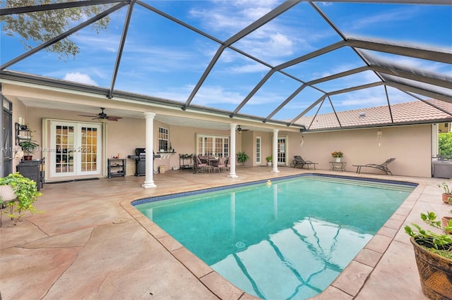 5655 NW 86th Ave, Coral Springs, FL 33067 - swimming pool featuring french doors, ceiling fan, a patio, and a lanai