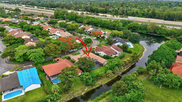 5655 NW 86th Ave, Coral Springs, FL 33067 - aerial perspective of suburban area featuring a nearby body of water