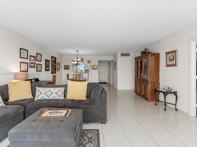 511 Bayshore Dr Unit 309, Fort Lauderdale, FL 33304 - living area with a chandelier and light tile patterned flooring