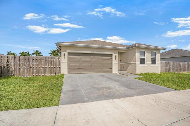 31671 SW 190th Ct, Homestead, FL 33030 - view of front of house with stucco siding, concrete driveway, and a garage