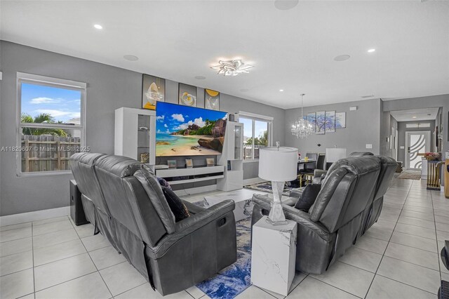 31671 SW 190th Ct, Homestead, FL 33030 - living room featuring recessed lighting, light tile patterned floors, and a chandelier