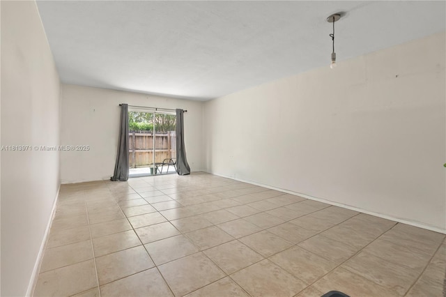 6711 N Kendall Dr Unit 505, Pinecrest, FL 33156 - spare room featuring light tile patterned floors and baseboards