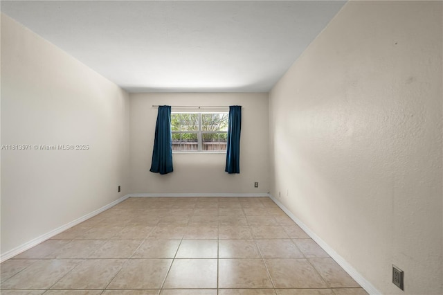 6711 N Kendall Dr Unit 505, Pinecrest, FL 33156 - unfurnished room featuring light tile patterned floors and baseboards