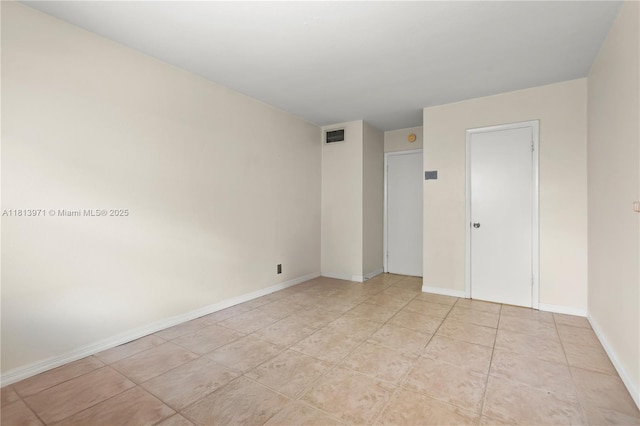 6711 N Kendall Dr Unit 505, Pinecrest, FL 33156 - empty room featuring baseboards and light tile patterned flooring